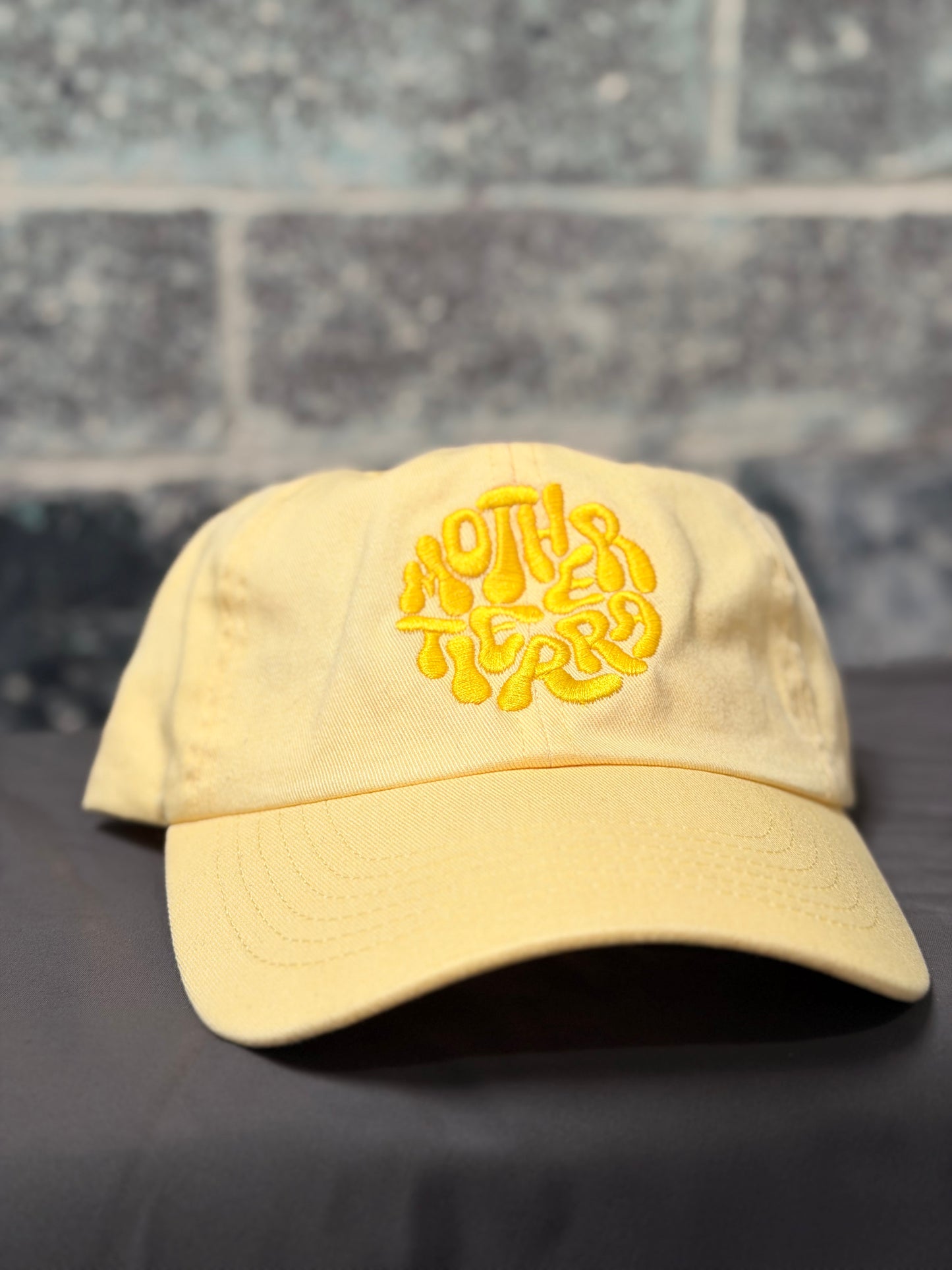 Sunshine yellow Mother logo