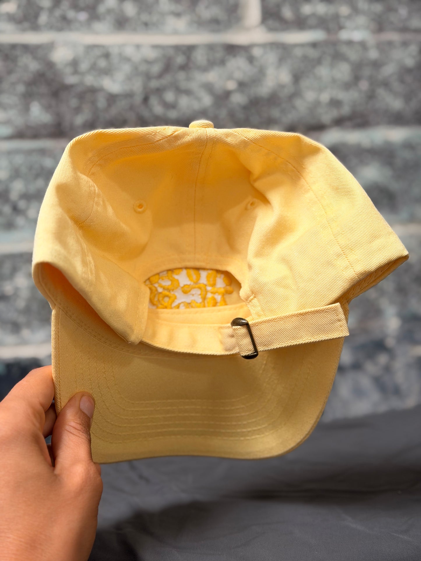 Sunshine yellow Mother logo